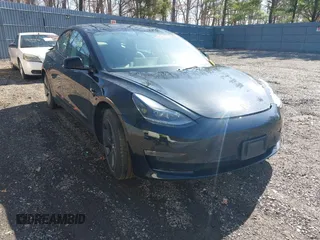 2023 Tesla Model 3 Long Range with VIN 5YJ3E1EB1PF392027, listed as a IAAI auction lot 41983638 with 31,415 mi miles and . Bid and sale history available at DreamBid. Image 1.