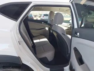 2019 Hyundai Tucson Value with VIN KM8J33A49KU979927, listed as a IAAI auction lot 41818355 with 96,208 mi miles. Bid and sale history available at carsss.com. Image 8.