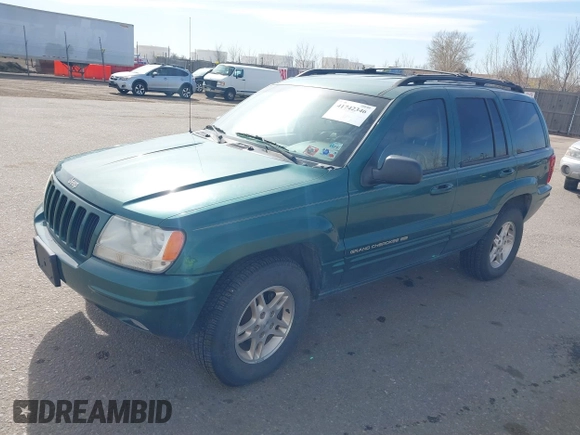 1999 Jeep Grand Cherokee Limited with VIN 1J4GW68N4XC544651, listed as a IAAI auction lot 41742346 with 94,904 mi miles and . Bid and sale history available at DreamBid. Image 2.