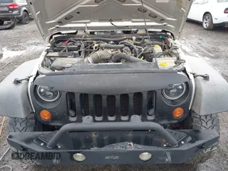 2007 Jeep Wrangler Unlimited X with VIN 1J4GA39187L209448, listed as a IAAI auction lot 42104328 with 138,302 mi miles and . Bid and sale history available at DreamBid. Image 10.