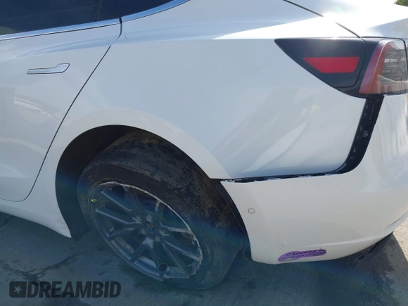 2018 Tesla Model 3 Long Range Battery with VIN 5YJ3E1EB7JF108519, listed as a IAAI auction lot 41835266 with 120,662 mi miles and . Bid and sale history available at DreamBid. Image 19.
