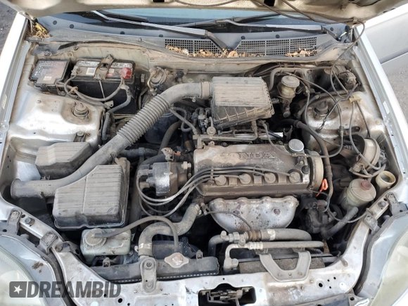 1999 Honda Civic LX z VIN JHMEJ6673XS001134, wystawiony jako Copart lot #42090765 z przebiegiem 265 318 mil mil oraz Szkoda całkowita • Salvage title. Historia ofert i sprzedaży dostępna na DreamBid. Obrazek 11.