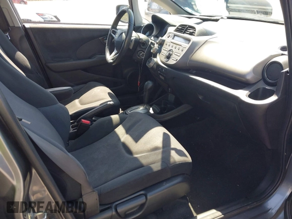 2011 Honda Fit Sport with VIN JHMGE8H52BC006588, listed as a IAAI auction lot 42205351 with 178,981 mi miles and . Bid and sale history available at DreamBid. Image 5.