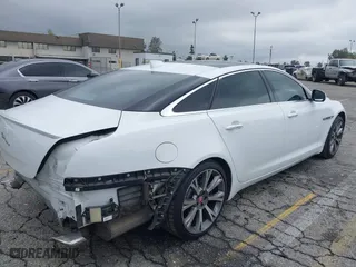 2016 Jaguar XJ with VIN SAJWA2GE3GMV93216, listed as a IAAI auction lot 41890225 with 70,007 mi miles. Bid and sale history available at carsss.com. Image 4.