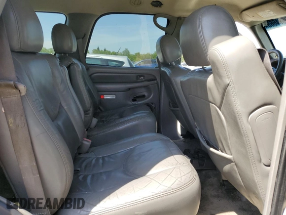 2003 GMC Yukon Denali z VIN 1GKEK63U13J255146, wystawiony jako Copart lot #53694665 z przebiegiem 256 523 mil mil oraz Szkody całkowita. Historia ofert i sprzedaży dostępna na DreamBid. Obrazek 11.