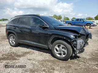 2022 Hyundai Tucson SEL with VIN 5NMJBCAE0NH140468, listed as a Copart auction lot 53829775 with 41,794 mi miles and Salvage Title. Bid and sale history available at DreamBid. Image 4.