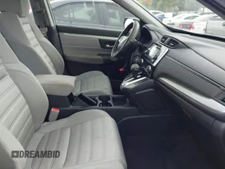 2018 Honda CR-V LX with VIN 2HKRW5H35JH401453, listed as a IAAI auction lot 41931225 with 106,854 mi miles and . Bid and sale history available at carsss.com. Image 5.