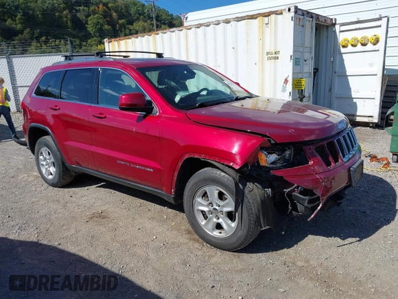2014 Jeep Grand Cherokee Laredo with VIN 1C4RJFAG8EC262292, listed as a IAAI auction lot 40568162 with 124,871 mi miles and . Bid and sale history available at DreamBid. Image 1.