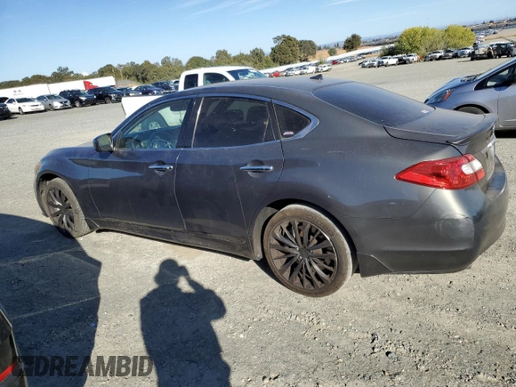 2011 Infiniti M37 with VIN JN1BY1AP5BM324255, listed as a Copart auction lot 79536504 with 82,652 mi miles and Salvage Title. Bid and sale history available at carsss.com. Image 2.