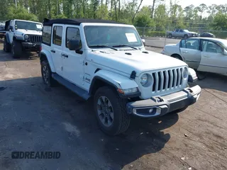 2018 Jeep Wrangler Unlimited Sahara z VIN 1C4HJXEG3JW175226, wystawiony jako IAAI lot #42307456 z przebiegiem 72 875 mil mil oraz . Historia ofert i sprzedaży dostępna na DreamBid. Obrazek 1.