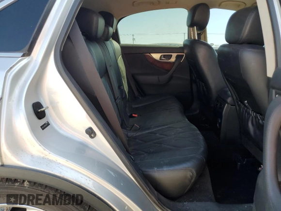 2010 Infiniti FX with VIN JN8AS1MW6AM851138, listed as a Copart auction lot 52698625 with 202,829 mi miles and Salvage title. Bid and sale history available at DreamBid. Image 11.