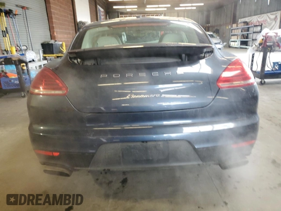 2014 Porsche Panamera z VIN WP0AA2A79EL009679, wystawiony jako Copart lot #49444915 z przebiegiem 80 908 mil mil oraz Szkody całkowita. Historia ofert i sprzedaży dostępna na DreamBid. Obrazek 6.