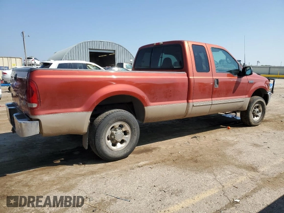 1999 Ford F-250 XL with VIN 1FTNX21SXXEE40026, listed as a Copart auction lot 69888634 with 215,535 mi miles and Salvage title. Bid and sale history available at DreamBid. Image 3.