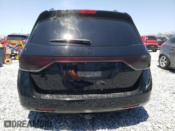 2014 Honda Odyssey Touring with VIN 5FNRL5H97EB016624, listed as a Copart auction lot 53444645 with 244,126 mi miles and Salvage Title. Bid and sale history available at DreamBid. Image 6.