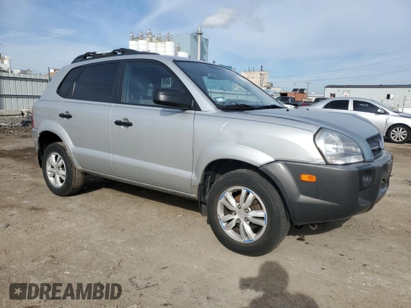 2009 Hyundai Tucson GLS with VIN KM8JM12B79U012399, listed as a Copart auction lot 77663414 with 164,615 mi miles and Salvage Title. Bid and sale history available at carsss.com. Image 4.