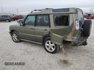 2000 Land Rover Discovery Cloth with VIN SALTY1247YA236168, listed as a Copart auction lot 84413524 with 179,465 mi miles and Salvage Title. Bid and sale history available at DreamBid. Image 2.