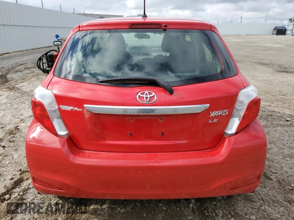2012 Toyota Yaris L with VIN JTDKTUD32CD517695, listed as a Copart auction lot 57392355 with 201,711 mi miles and Salvage title. Bid and sale history available at DreamBid. Image 6.