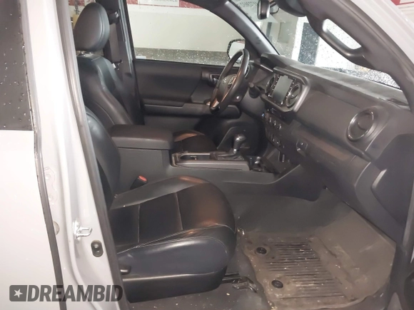2021 Toyota Tacoma SR5 z VIN 3TMDZ5BN5MM114494, wystawiony jako IAAI lot #41723032 z przebiegiem 54 477 mil mil oraz . Historia ofert i sprzedaży dostępna na DreamBid. Obrazek 5.