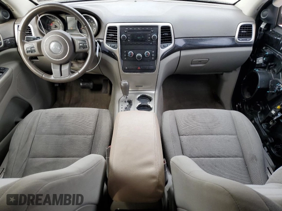 2011 Jeep Grand Cherokee Laredo with VIN 1J4RS4GG8BC508482, listed as a Copart auction lot 79261304 with 208,265 mi miles and Salvage Title. Bid and sale history available at DreamBid. Image 8.