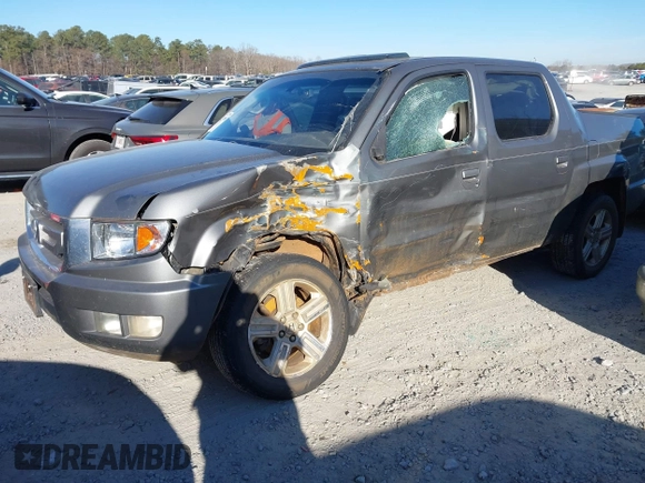 2010 Honda Ridgeline RTL with VIN 5FPYK1F52AB004678, listed as a IAAI auction lot 41661968 with 169,021 mi miles. Bid and sale history available at carsss.com. Image 2.