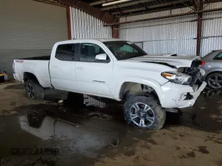 2021 Toyota Tacoma 4WD SR5 with VIN 3TMDZ5BN4MM106693, listed as a Copart auction lot 45278655 with 52,510 mi miles and Salvage Title. Bid and sale history available at carsss.com. Image 4.