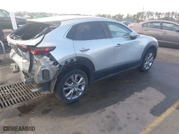 2021 Mazda CX-30 Select with VIN 3MVDMABL8MM231295, listed as a IAAI auction lot 41526990 with 133,144 mi miles. Bid and sale history available at carsss.com. Image 4.