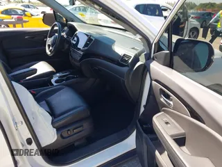 2022 Honda Pilot Touring 7-Passenger с VIN 5FNYF5H66NB034248, выставлен на аукционе IAAI как лот 41777362 с пробегом 26 611 миль миль и . История ставок и продаж доступна на DreamBid. Изображение 5.