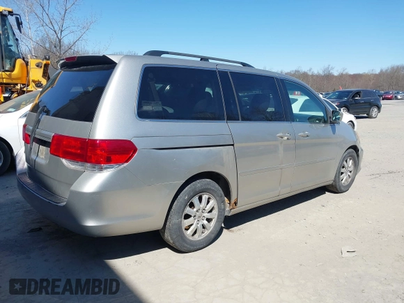 2008 Honda Odyssey EX-L with VIN 5FNRL38738B098262, listed as a IAAI auction lot 42061465 with 207,825 mi miles and . Bid and sale history available at DreamBid. Image 4.