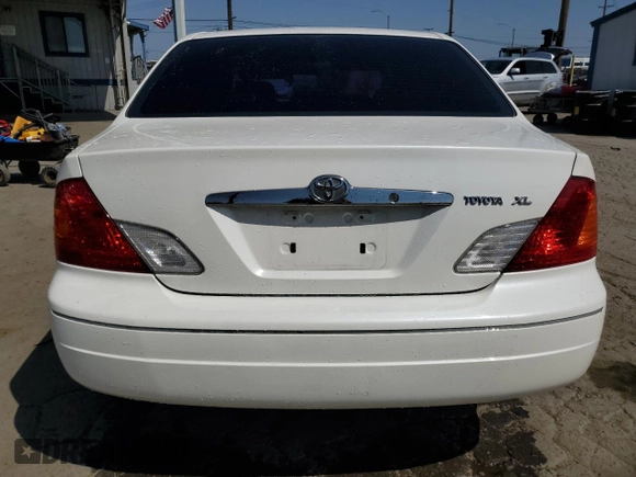 2000 Toyota Avalon XL with VIN 4T1BF28B9YU068001, listed as a Copart auction lot 54958915 with 240,232 mi miles and Salvage Title. Bid and sale history available at DreamBid. Image 6.