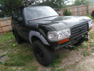 1995 Toyota Land Cruiser z VIN JT3DJ81W7S0111278, wystawiony jako IAAI lot #42483161 z przebiegiem 89 603 mil mil oraz . Historia ofert i sprzedaży dostępna na DreamBid. Obrazek 1.