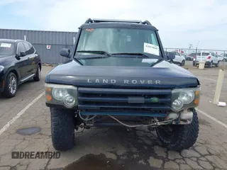 2004 Land Rover Discovery SE with VIN SALTW19464A860565, listed as a IAAI auction lot 42019860 with 153,274 mi miles. Bid and sale history available at carsss.com. Image 13.
