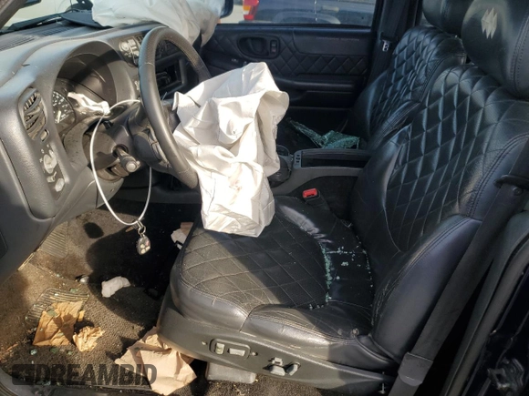 2000 GMC Jimmy Diamond Edition Luxury z VIN 1GKDT13W9Y2305564, wystawiony jako Copart lot #49488665 z przebiegiem 256 410 mil mil oraz Szkoda całkowita • Salvage title. Historia ofert i sprzedaży dostępna na DreamBid. Obrazek 7.