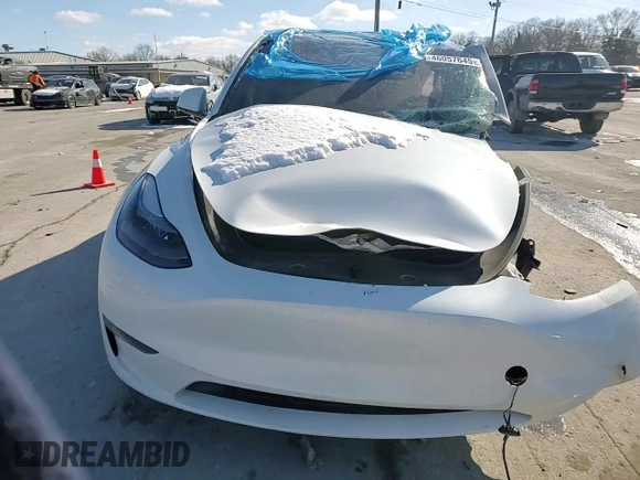 2023 Tesla Model Y Long Range with VIN 7SAYGAEE3PF767171, listed as a Copart auction lot 46057645 with Not Provided miles and Salvage Title. Bid and sale history available at DreamBid. Image 10.