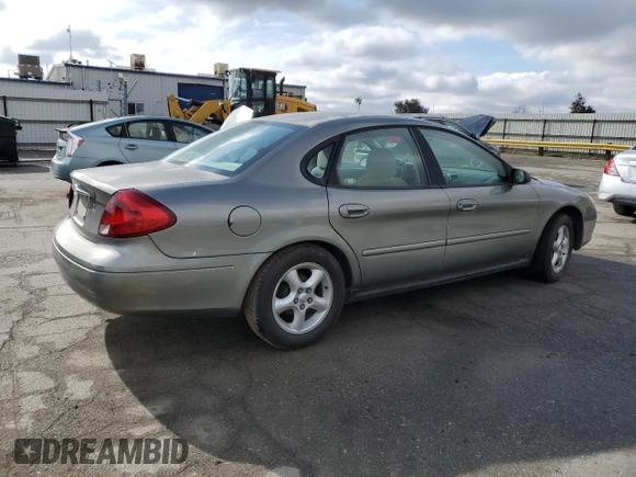 2001 Ford Taurus LX with VIN 1FAFP52U01A131563, listed as a Copart auction lot 89201965 with 79,048 mi miles and Salvage title. Bid and sale history available at DreamBid. Image 3.