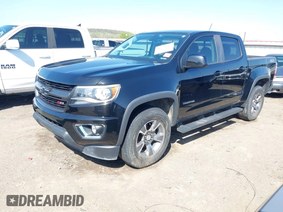 2018 Chevrolet Colorado 4WD Z71 z VIN 1GCGTDEN0J1173420, wystawiony jako IAAI lot #41971813 z przebiegiem 98 499 mil mil oraz . Historia ofert i sprzedaży dostępna na DreamBid. Obrazek 18.