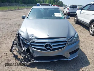 2014 Mercedes-Benz E 350 Sport with VIN WDDHF5KB5EA897093, listed as a IAAI auction lot 42152144 with 120,627 mi miles and . Bid and sale history available at DreamBid. Image 12.