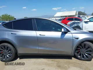 2024 Tesla Model Y Performance with VIN 7SAYGDEF9RA299036, listed as a IAAI auction lot 42140788 with 14,844 mi miles and . Bid and sale history available at DreamBid. Image 12.