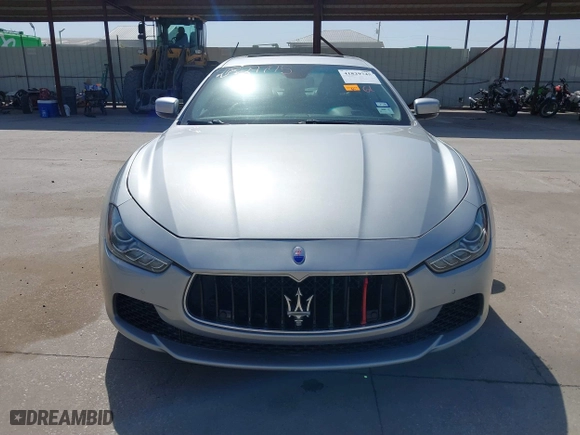 2014 Maserati Ghibli S Q4 with VIN ZAM57RTA8E1085631, listed as a IAAI auction lot 41829745 with 80,418 mi miles. Bid and sale history available at carsss.com. Image 12.