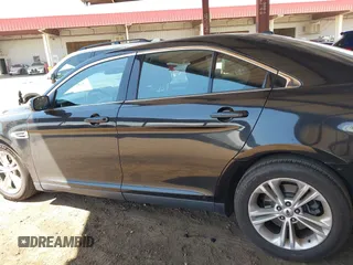 2014 Ford Taurus SEL with VIN 1FAHP2E82EG153430, listed as a IAAI auction lot 42022188 with 193,947 mi miles and . Bid and sale history available at DreamBid. Image 14.