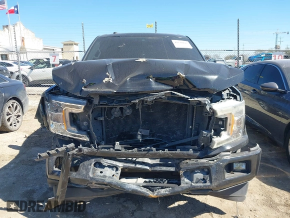 2019 Ford F-150 XL with VIN 1FTEW1C59KKE38668, listed as a IAAI auction lot 41538187 with 109,704 mi miles and . Bid and sale history available at DreamBid. Image 12.