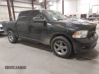 2011 Ram 1500 Big Horn with VIN 1D7RV1CT1BS645810, listed as a IAAI auction lot 41450528 with 148,091 mi miles and . Bid and sale history available at DreamBid. Image 1.