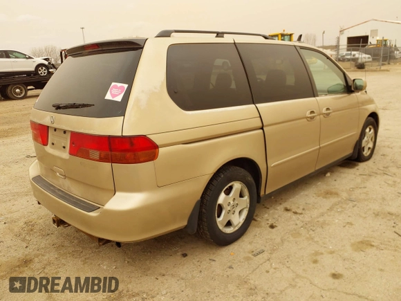 2000 Honda Odyssey EX z VIN 2HKRL1868YH595787, wystawiony jako IAAI lot #41823390 z przebiegiem 243 111 mil mil oraz . Historia ofert i sprzedaży dostępna na DreamBid. Obrazek 4.
