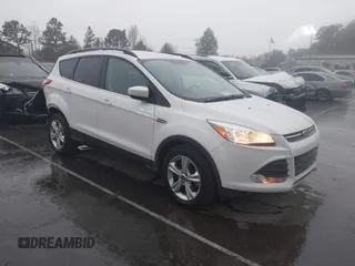 2016 Ford Escape SE with VIN 1FMCU0GX4GUC23998, listed as a IAAI auction lot 41917522 with 96,491 mi miles and . Bid and sale history available at carsss.com. Image 1.