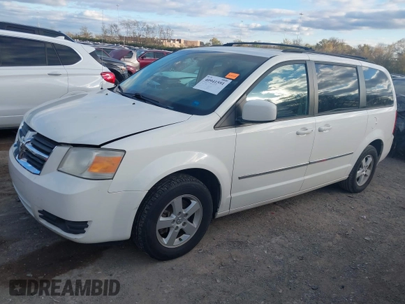 2010 Dodge Grand Caravan SXT with VIN 2D4RN5D17AR444818, listed as a IAAI auction lot 40941591 with Not Provided miles and . Bid and sale history available at DreamBid. Image 2.