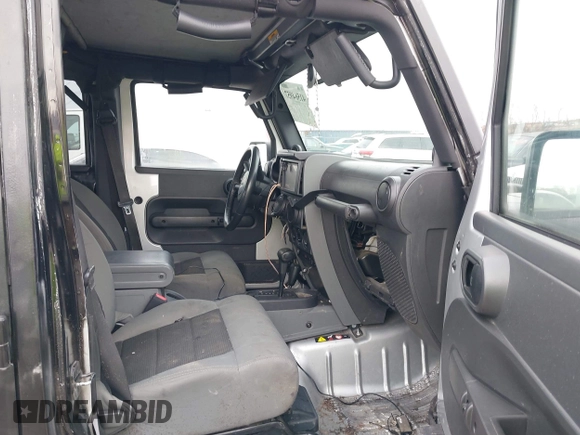 2008 Jeep Wrangler Unlimited X with VIN 1J8GA39148L577903, listed as a IAAI auction lot 41564957 with 95,359 mi miles. Bid and sale history available at carsss.com. Image 5.