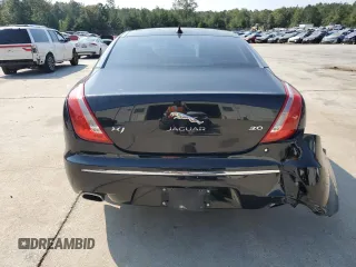 2015 Jaguar XJ with VIN SAJWA1CZ7F8V83167, listed as a Copart auction lot 74991144 with 94,502 mi miles and Salvage Title. Bid and sale history available at carsss.com. Image 6.