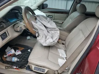 1999 Cadillac DeVille DHS z VIN 1G6KE54Y1XU727497, wystawiony jako Copart lot #56031715 z przebiegiem 76 245 mil mil oraz Szkoda całkowita • Salvage title. Historia ofert i sprzedaży dostępna na DreamBid. Obrazek 7.