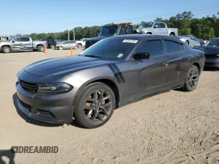 2019 Dodge Charger SXT z VIN 2C3CDXBG6KH700547, wystawiony jako Copart lot #52092765 z przebiegiem 82 065 mil mil oraz Szkoda całkowita • Salvage title. Historia ofert i sprzedaży dostępna na DreamBid. Obrazek 1.