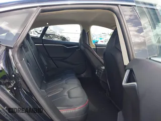 2014 Tesla Model S 60 с VIN 5YJSA1H17EFP41957, выставлен на аукционе IAAI как лот 42448795 с пробегом 103 990 миль миль и . История ставок и продаж доступна на DreamBid. Изображение 7.