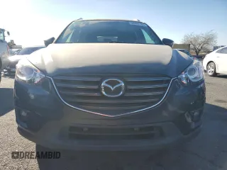 2016 Mazda CX-5 Touring with VIN JM3KE2CYXG0906293, listed as a Copart auction lot 46484185 with 89,544 mi miles and Salvage Title. Bid and sale history available at carsss.com. Image 5.
